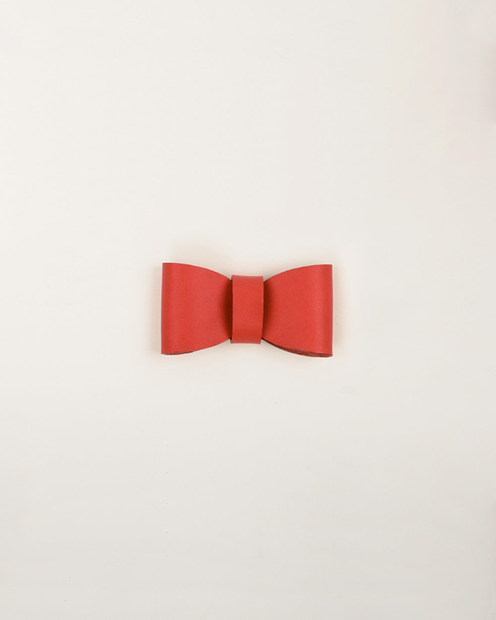 Bow tie · dog collar or harness · red leather · INDÓMITO